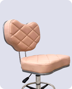 A black leather armchair with dark wood arms in a modern room setting.